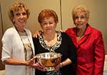 Awards Chairman Jerri Klein presents Outstanding Woman of the Year Award to Betty Ennicios with President Carrel Epling Awards Chairman Jerri Klein presents Outstanding Woman of the Year Award to Betty Ennicios with President Carrel Epling