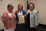Cindy Garic, President, Emily Nichole Stark of Chapelle High School and Melanie Rose, Scholarship Chairman Cindy Garic, President, Emily Nichole Stark of Chapelle High School and Melanie Rose, Scholarship Chairman