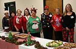 Hostesses December Cindy Enright, Caroline Bartolotta, Jerry Gast, Fran Puig, Lynn Courrege, Eleanor Hebert, June Prados and Heidi Burke Hostesses December Cindy Enright, Caroline Bartolotta, Jerry Gast, Fran Puig, Lynn Courrege, Eleanor Hebert, June Prados and Heidi Burke