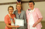 Joan Donnow is presented a certificate upon the celebration of her 25 years of membership in Metairie Woman's Club. On left is June Prados, membership chairman, and on right is Sue Rooney, president of the club. Joan Donnow is presented a certificate upon the celebration of her 25 years of membership in Metairie Woman's Club. On left is June Prados, membership chairman, and on right is Sue Rooney, president of the club.