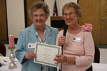 Sydney Condon receives a certificate for 25 years membership from June Prados Sydney Condon receives a certificate for 25 years membership from June Prados