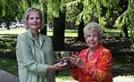 MWC Awards Chairman Coleen Landry presents 2019-2020 Outstanding Woman Award to Carrell Epling MWC Awards Chairman Coleen Landry presents 2019-2020 Outstanding Woman Award to Carrell Epling