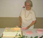 President Iona Myers cuts the cake on the  71st anniversary of Metairie Woman's Club