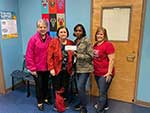 MWC Presentation to Hilda Knoff School - Patricia Seale, MWC President; Linda Morgan, Philanthropic Chairman; Leslie Turnbull, Princial of Hilda Knoff School; Liz Gurt MWC Presentation to Hilda Knoff School - Patricia Seale, MWC President; Linda Morgan, Philanthropic Chairman; Leslie Turnbull, Princial of Hilda Knoff School; Liz Gurt
