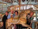 Presenting a check for $4,000 to Mr. Beau Bassich, executive director of New Orleans City Park for the restoration of the 100 year old Carousel that was damaged in floodwaters of Hurricane Katrina, are, from left, Joan Demarest, Evelyn Smith and Coleen Landry.