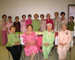 Past presidents celebrating Founder's Day are, seated from left, Audie Scardina, Julie Lawton, Bea Mestayer, and Beverly Watts.  Standing, from left, are Jane Livaudais, Mary Membreno, Kathleen McGregor, Irene Rogillio, Joan Demarest, Ella Geisler, Irma Klein, Beverly Christina, Ginger Crawford, Virginia Cullens and Marguerite Ricks.
