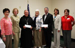 Linda Sharp, Coleen Landry, Abbot Justin Brown of St. Joseph's Abbey, President Linda Deichmann, Luis Arocha of Cafe' Hope, Carolyn Chassee of East Jefferson Hospital Foundation and Fran Puig Linda Sharp, Coleen Landry, Abbot Justin Brown of St. Joseph's Abbey, President Linda Deichmann, Luis Arocha of Cafe' Hope, Carolyn Chassee of East Jefferson Hospital Foundation and Fran Puig