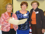 New member-Suzi Clemmensen is welcomed to the Club by June Prados, membership chairman, on left, and Jane Livaudais, sponsor, on right New member-Suzi Clemmensen is welcomed to the Club by June Prados, membership chairman, on left, and Jane Livaudais, sponsor, on right